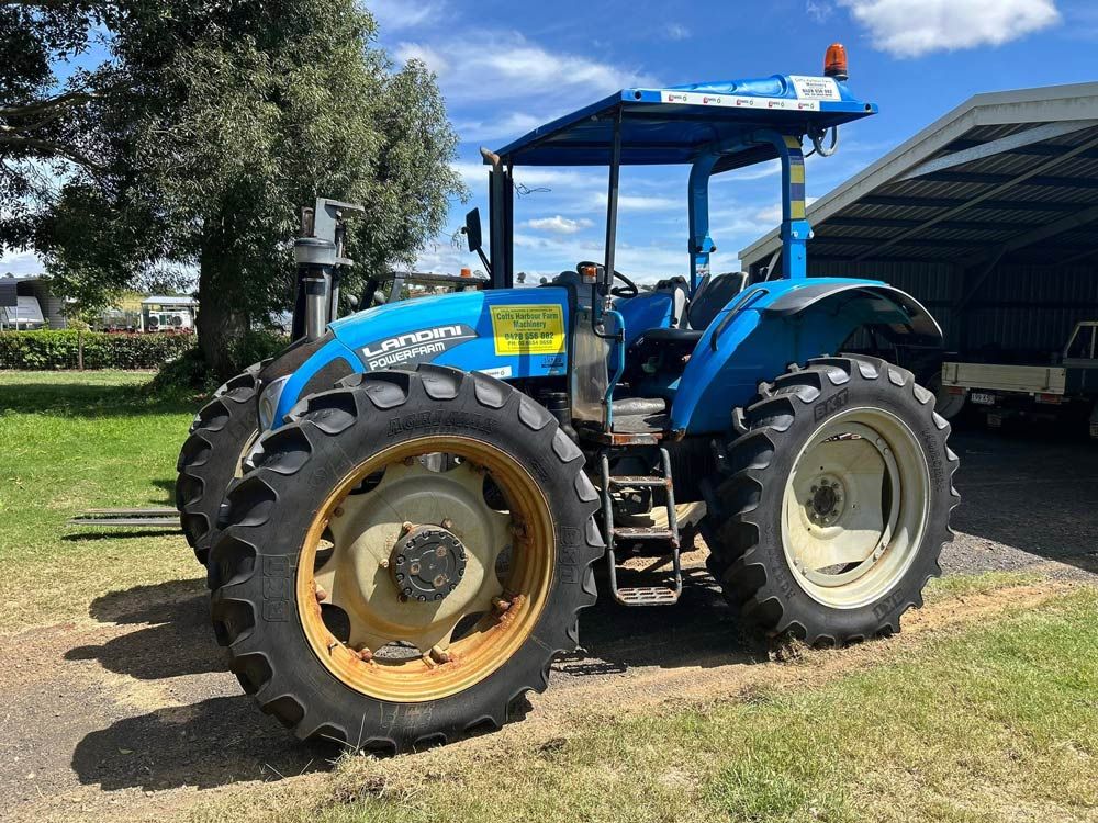 Blue Tractor on A Farming Site